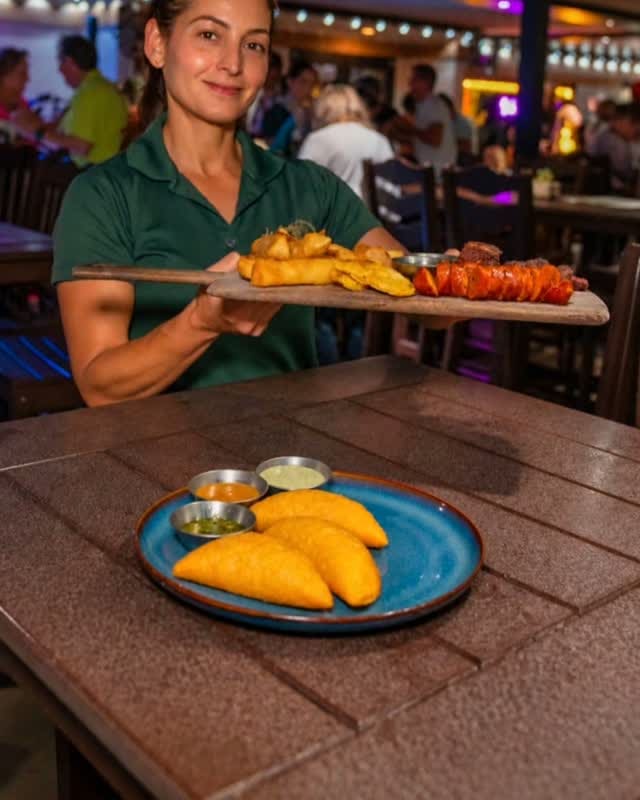 Sharing Board with green plantain, chorizo and fries, served on the Roof Top